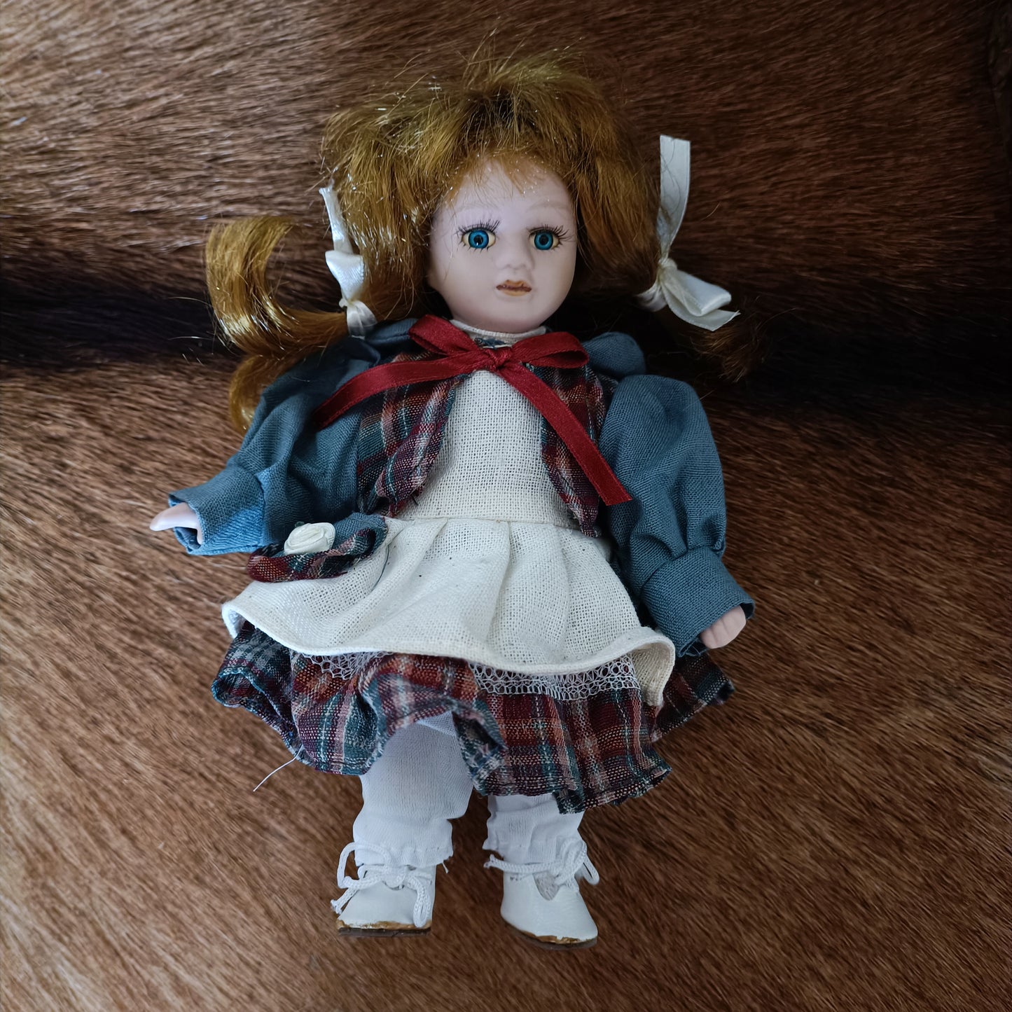 Poupée porcelaine